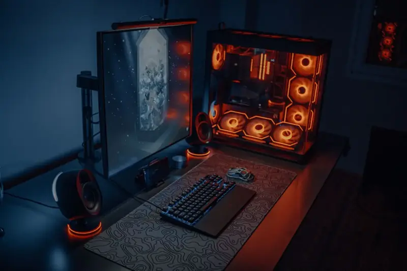 Desk setup glowing with RGB LED lighting